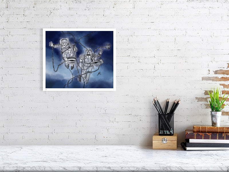 A large unframed print featuring two cartoon characters resembling Marley and Marley from A Muppet Christmas Carol, depicted with chains and flying through a dark sky. Print hangs on a white brick wall.
