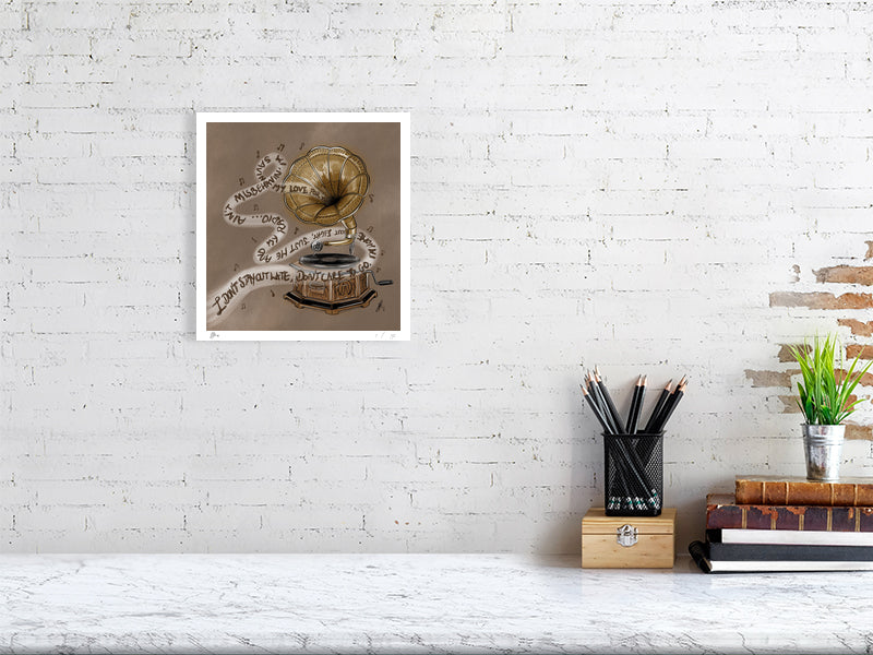An unframed print of an artwork featuring an old-fashioned record player, hanging on a white brick wall