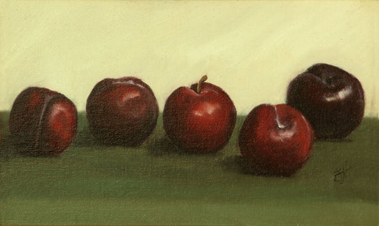 A traditional style oil painting still life of five ripe plums on a deep green cloth, signed by Sophie Hall.
