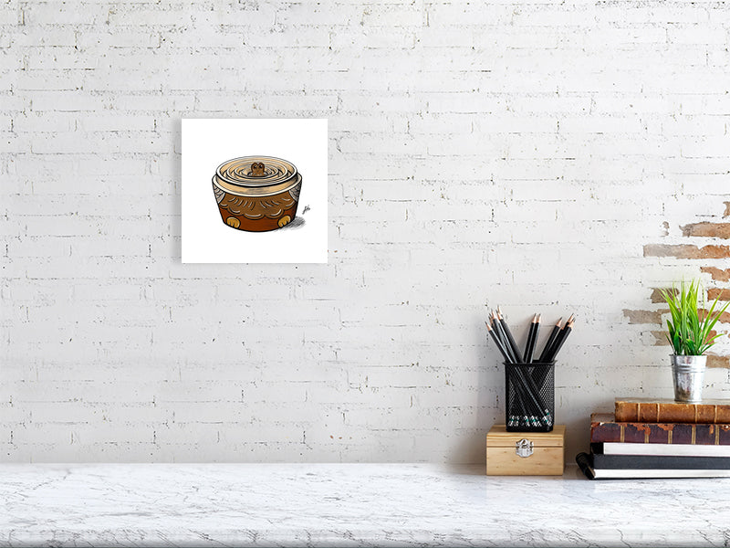 A small unframed digital ink illustration of a Russian Nesting Doll in the style of a brown owl, with the smallest doll visible sitting in the stacked bases of the other dolls. Hanging on a white brick wall.