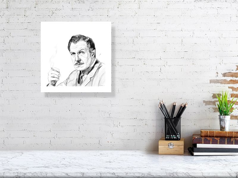 Large unframed pencil portrait of Vincent Price, iconic horror actor, signed by the artist and hanging on a white brick wall over a desk.